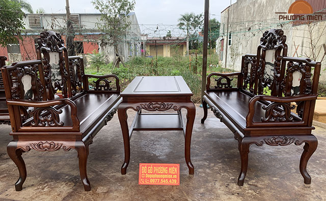 Mẫu bàn ghế hoa lá tây gỗ gụ chất lượng.